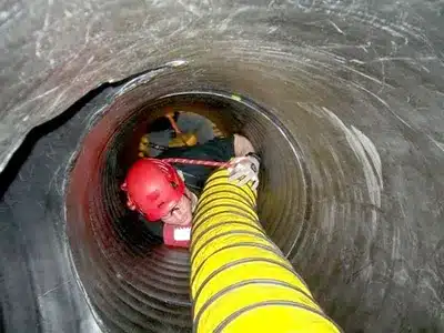 Firefighter performing confined space rescue services in Ohio